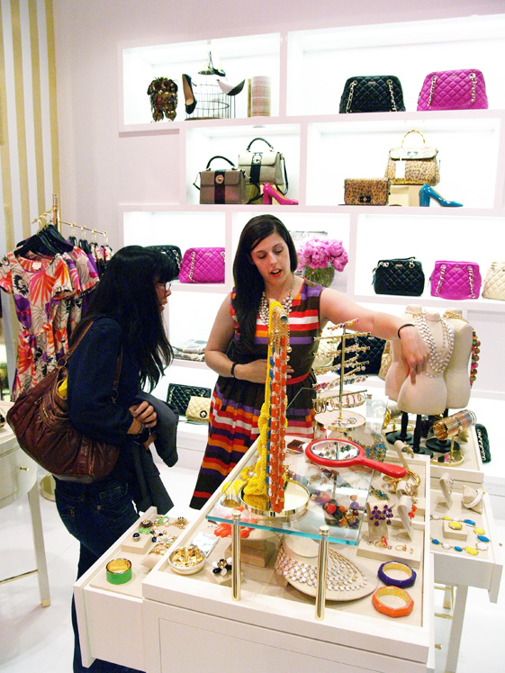 Adria helping customer pick out jewelry