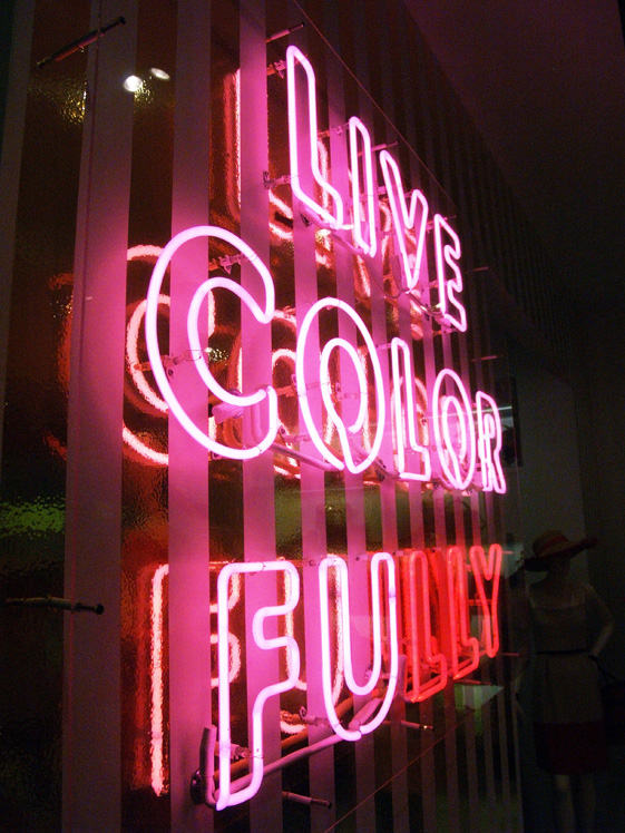 Kate Spade motto sign