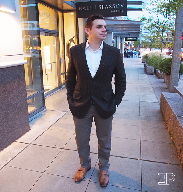 men's fashion week style: gray slacks, warm caramel loafers, and a black pinstripe blazer