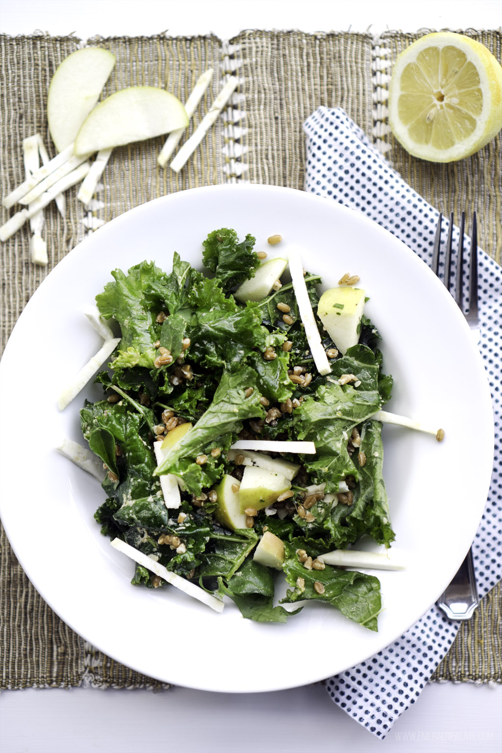 Overhead shot of a kale power salad bowl on a place mat