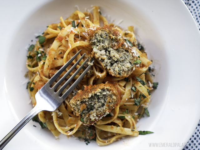 two veggie meatballs split open to show he inside of the romanesco pasta recipe