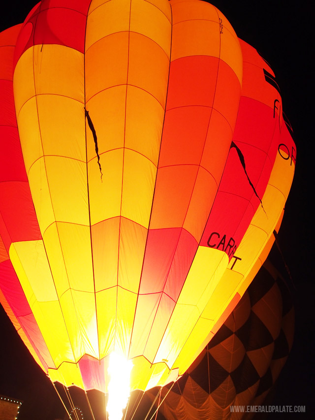 A close up of a glowing hot air balloon at the Winthrop Hot Air Balloon Festival in Winthrop, WA.