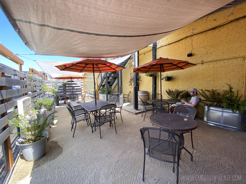 back patio with umbrellas at Iris Vineyards in Willamette Valley, Oregon