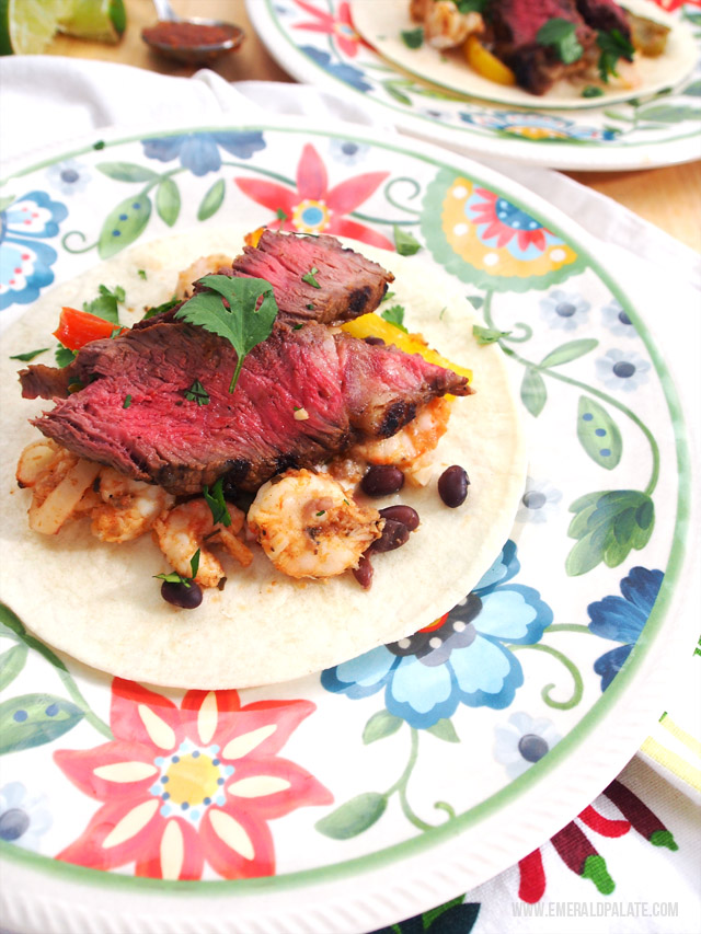 An easy and healthy fajita recipe including shrimp, steak, and a creole sauce. It makes the perfect weeknight meal!