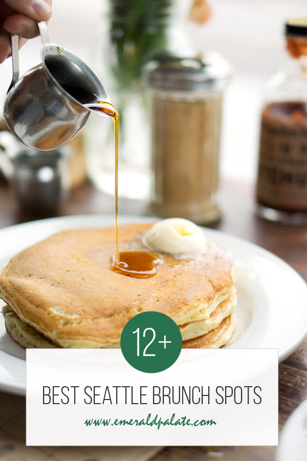 person pouring maple syrup over short stack pancakes