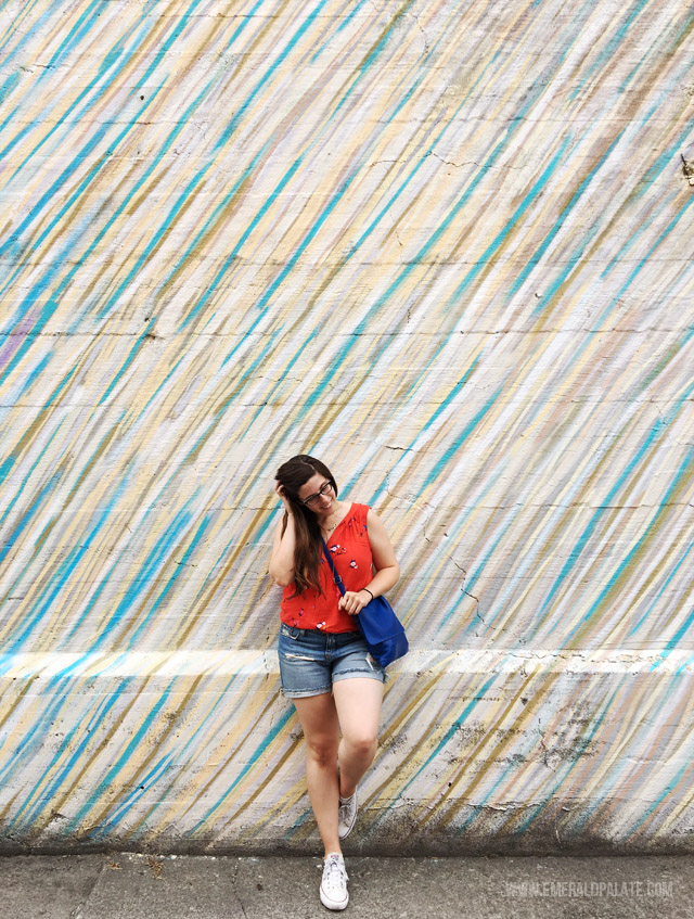 The Emerald Palate in front of a gorgeous mural wall in Spokane, WA.