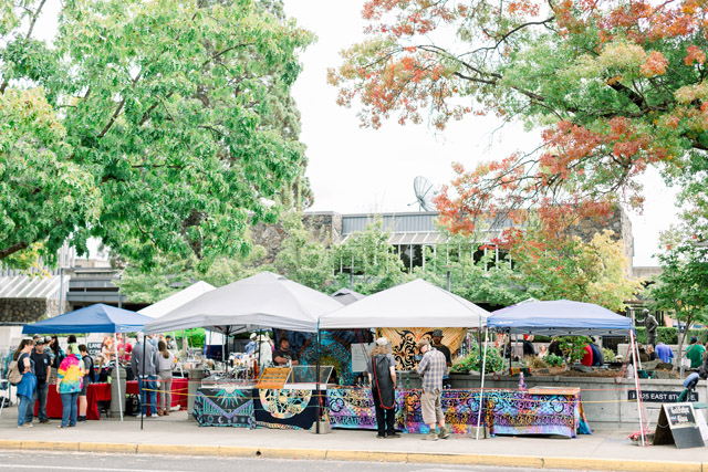 View of the tents set up at the Eugene, Oregon farmers market. It is one of the biggest farmers markets in Oregon and is one of the best things to do in Willamette Valley!