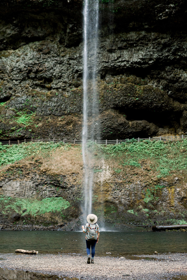 The view of a waterfall at the bottom of an Oregon hike. This can be found at Silver Falls State Park.  If you are looking for the best Oregon hikes, easy Oregon hikes, waterfall hikes, Oregon waterfalls, the best things to do in Oregon, family-friendly hikes, the best things to do in Willamette Valley, you will find it in Silver Falls State Park!