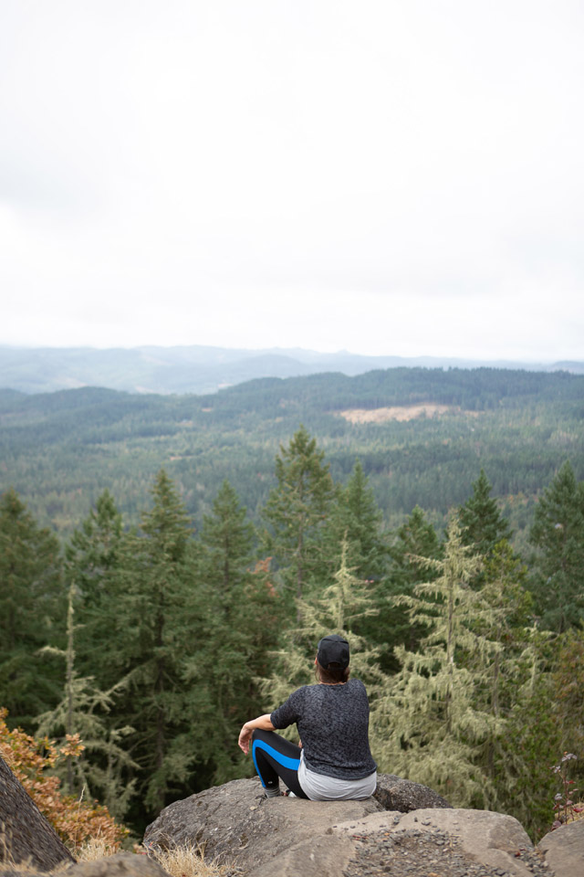 At peace among pine trees at the top of Spencer Butte hike in Eugene, Oregon