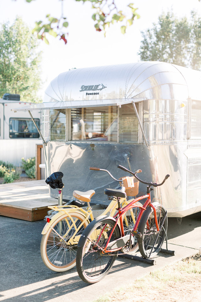 You get free bikes when you go glamping in Oregon at The Vintages Resort. It is a unique wine country lodging option that refurbishes vintage trailers right in the heart of the Willamette Valley.