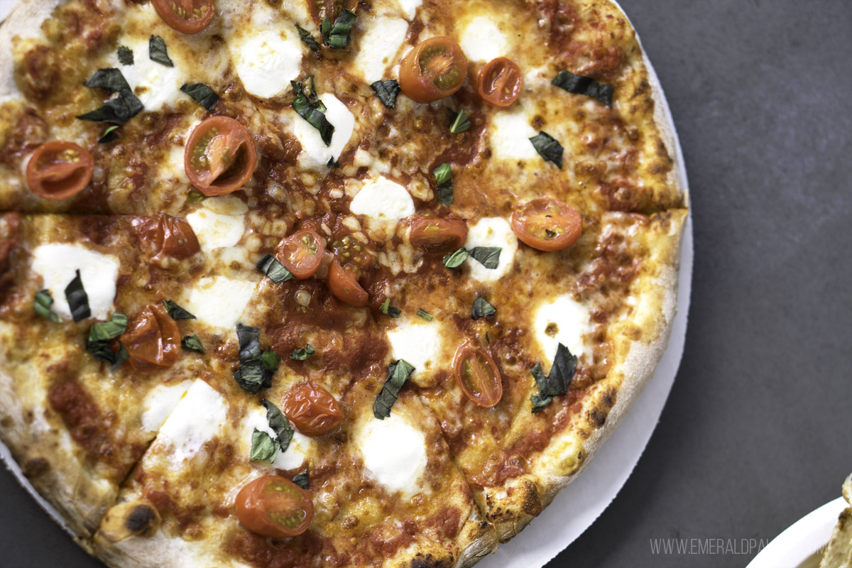 overhead shot of pizza that you must try during your one day in Phoenix