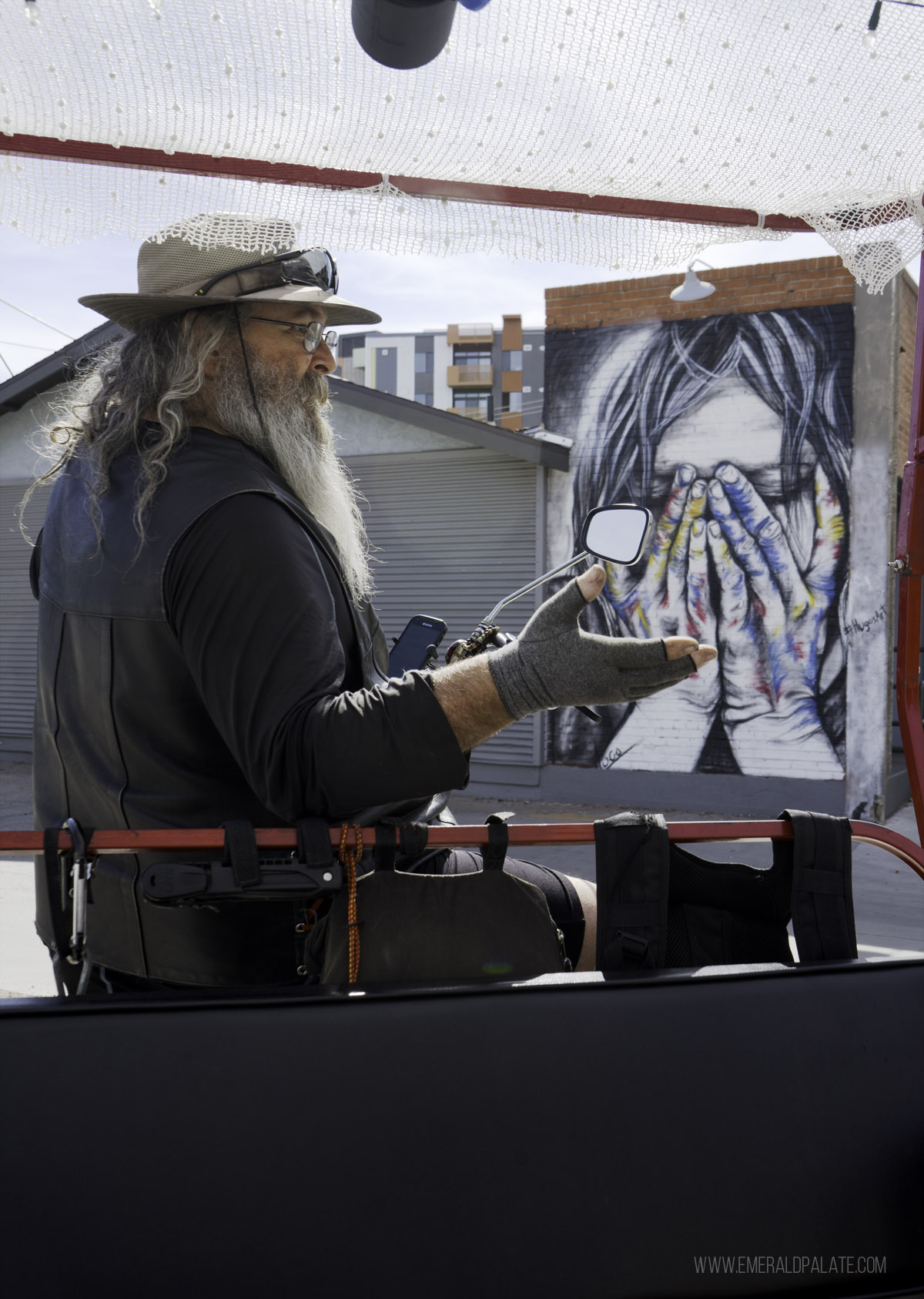 tour guide giving a talk about murals in Phoenix Roosevelt Row