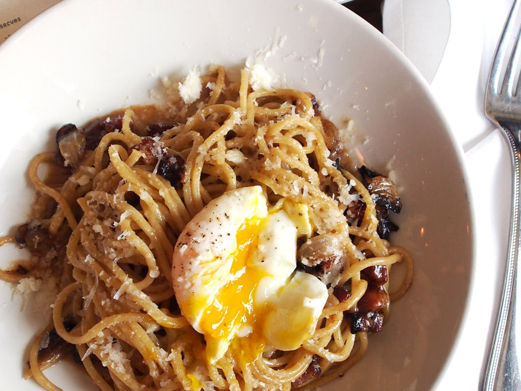 carbonara with a runny egg from the best pasta restaurant in Seattle