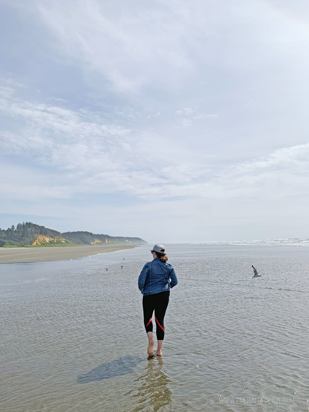 woman walking on beach, one of the best things to do in Seabrook, WA