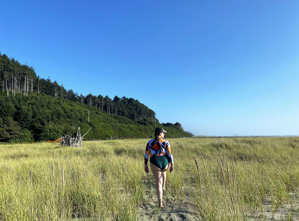 woman walking on beach, one of the best things to do in Seabrook, WA