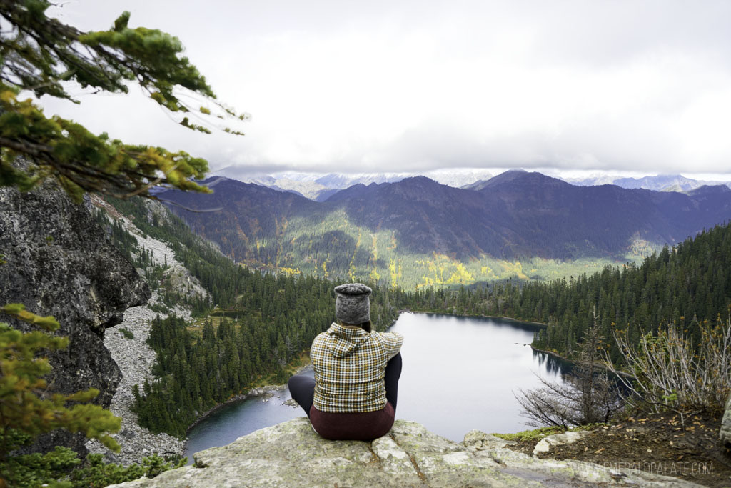 woman overlooking one of the best larch hikes