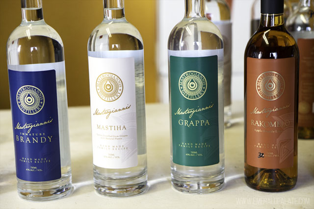 Line of spirit bottles at Mastrogianni Distillery, a Greek distillery in Lakewood WA near Tacoma