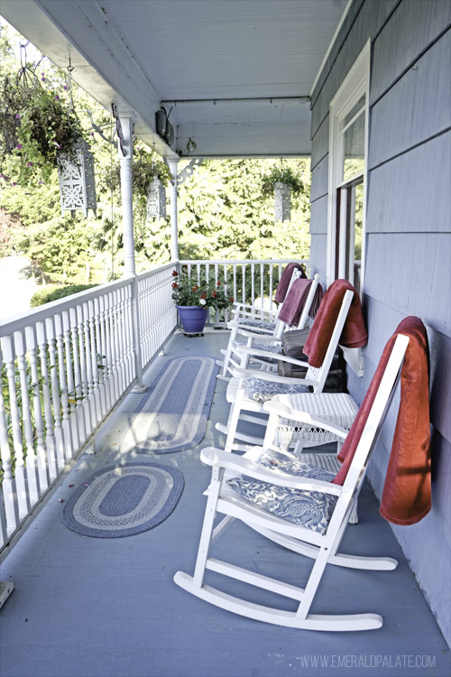 Rocking chairs on the porch of the Katy's Inn in La Conner, the bed and breakfast inside a historic home we'll stay at during our group retreat in Washington state