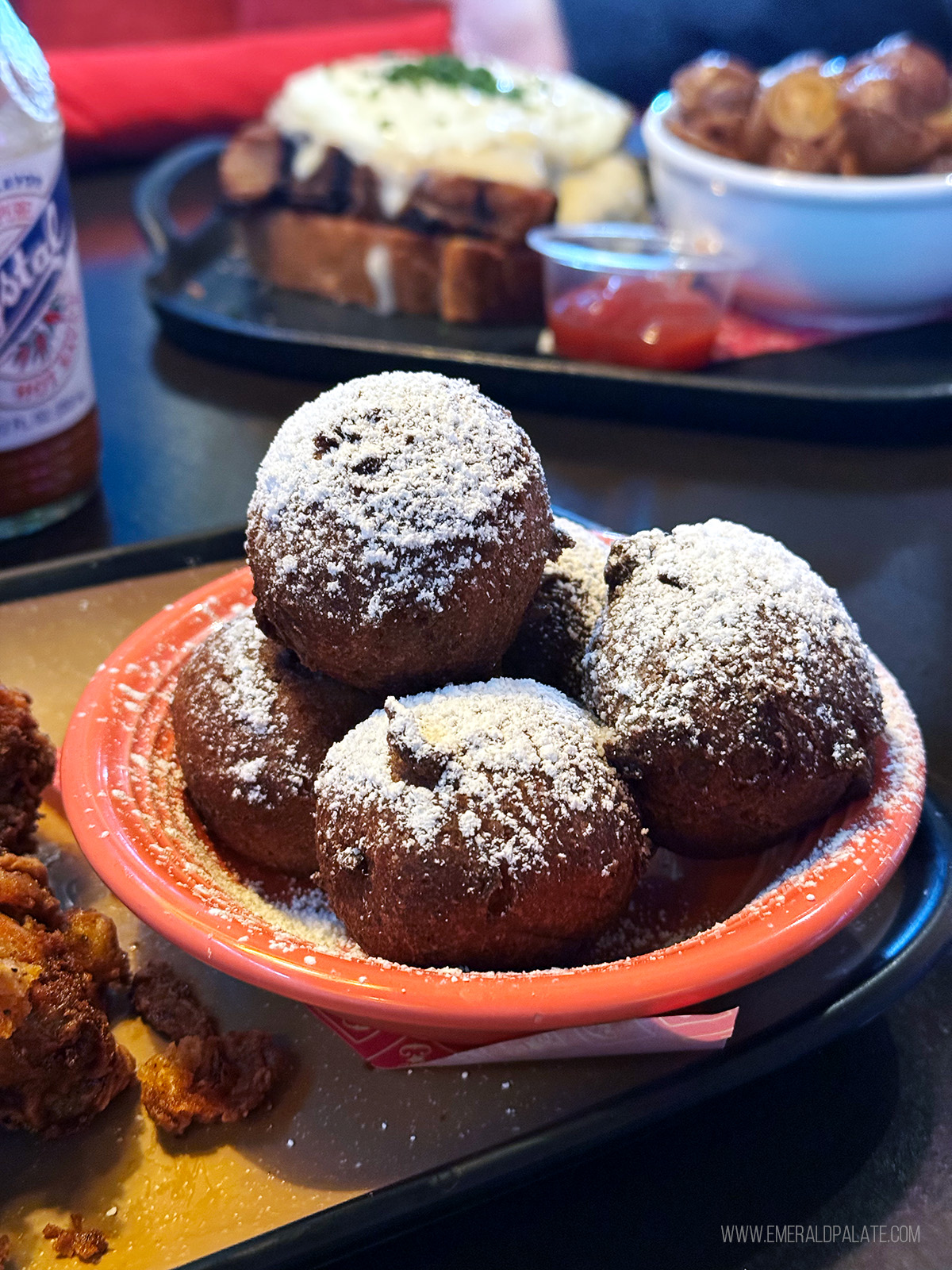 pillowy beignets covered in powdered sugar