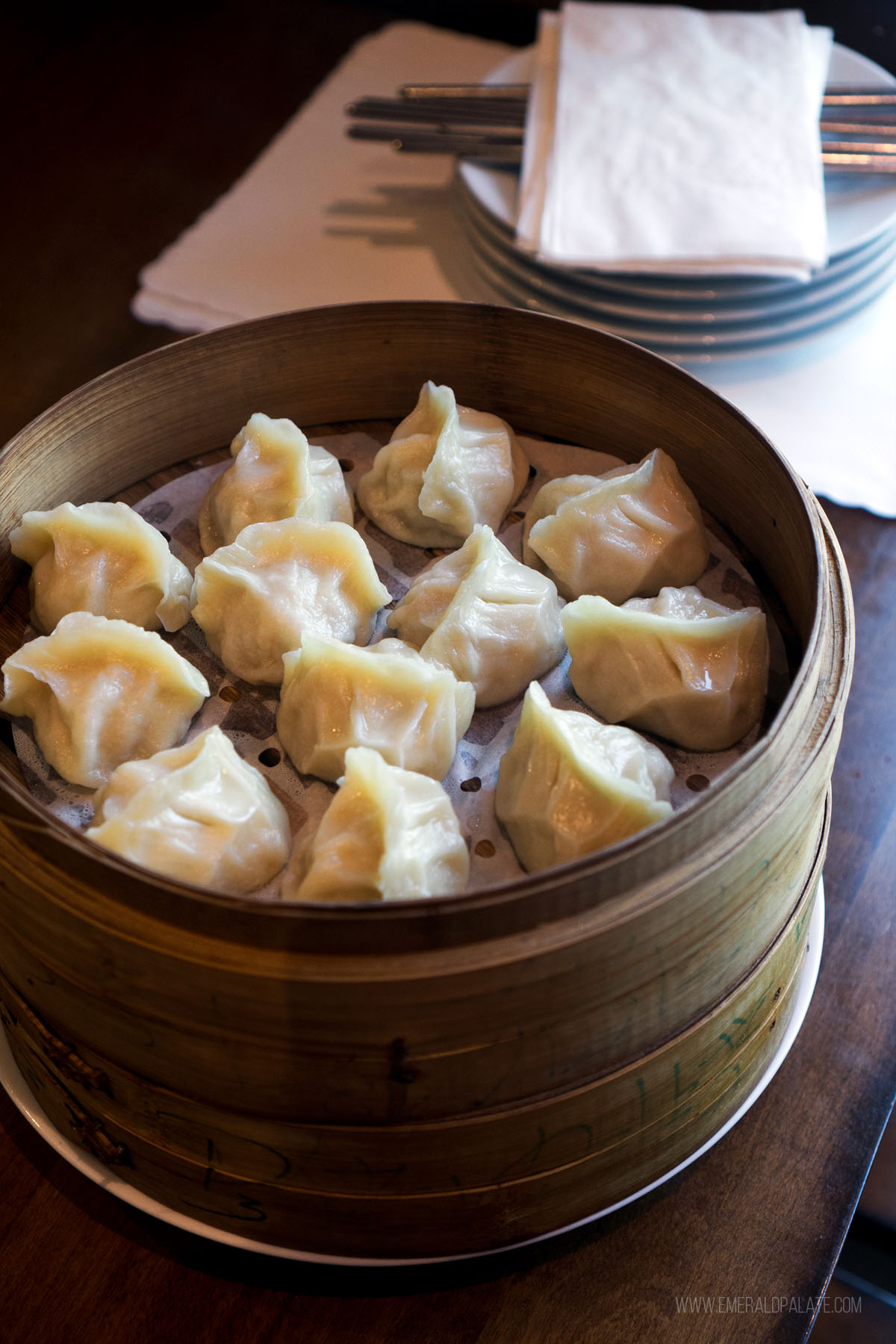 dumplings in a bamboo steamer basket at one of the best restaurants in Edmonds WA
