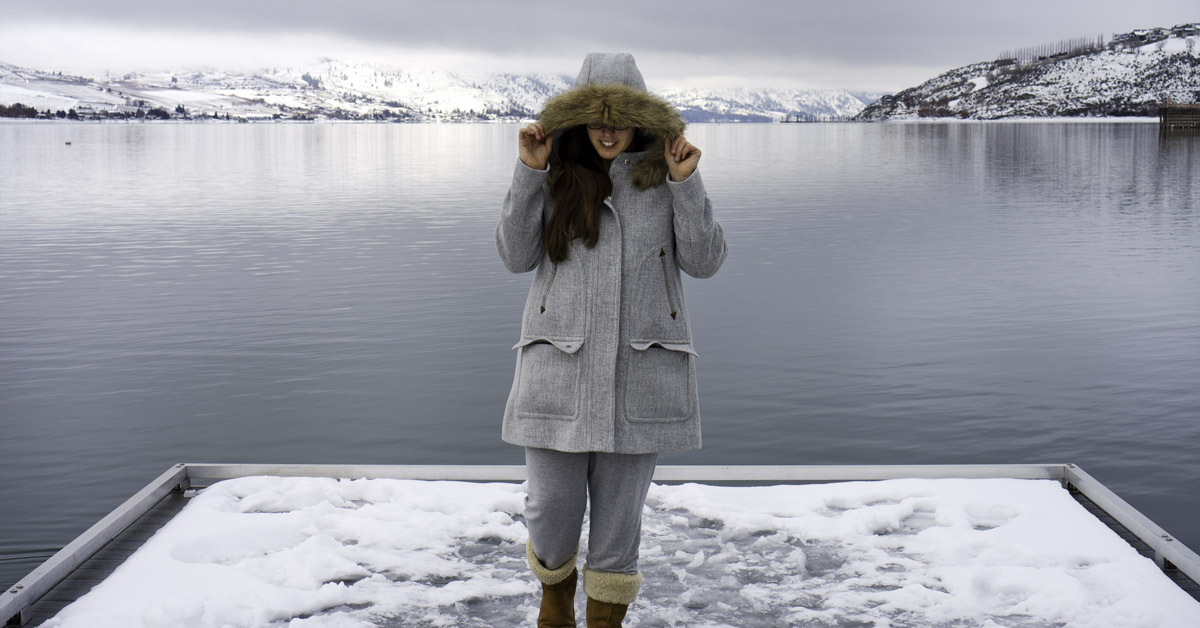 Person on a dock on Lake Chelan in winter
