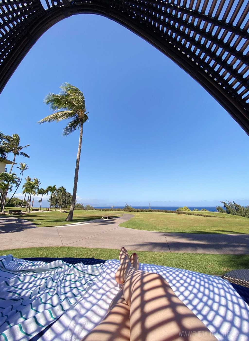 woman lounging at a spa pool