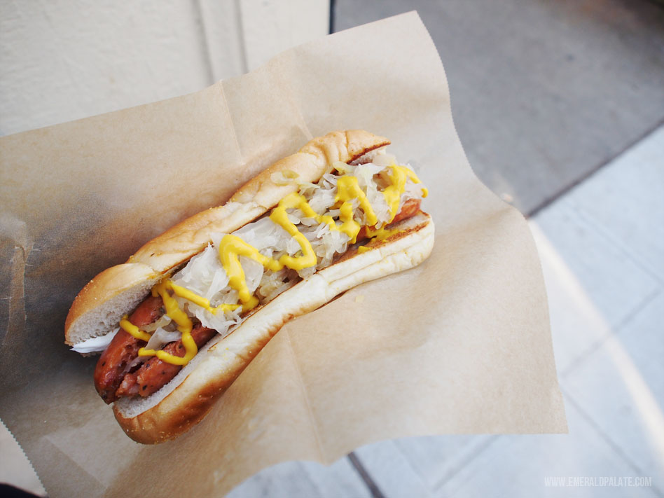 A Seattle dog, a must get at Dantes Inferno Dog, at the Ballard Farmers Market