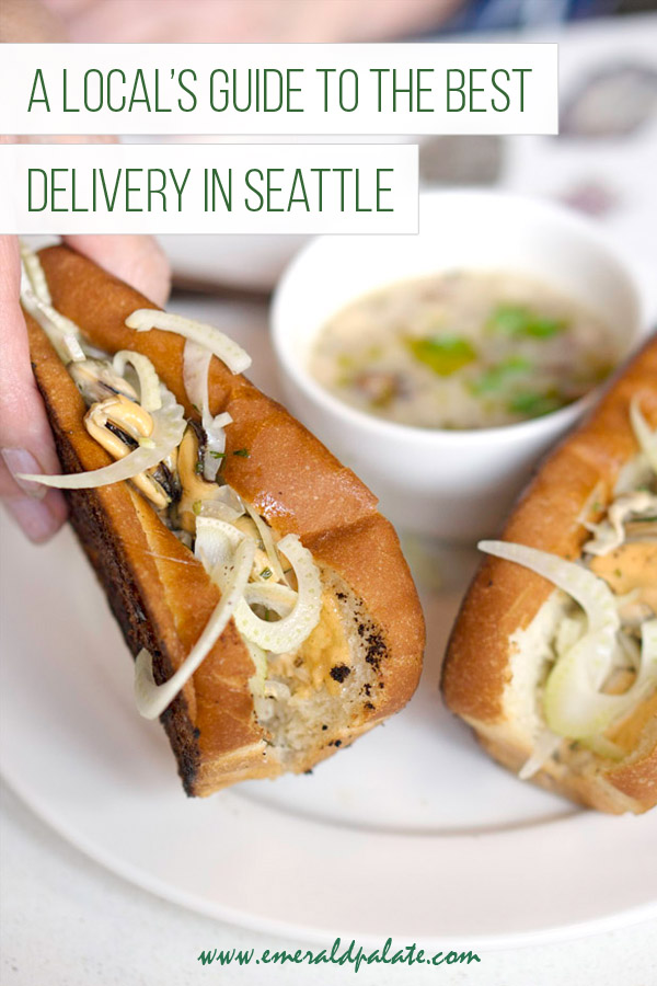 person holding mussel sandwich, which is some of the best food delivery in Seattle