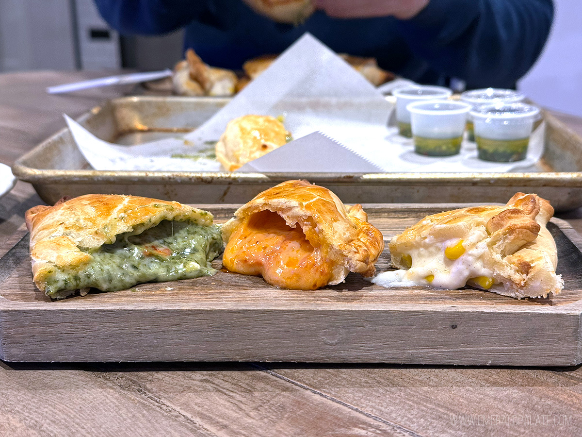 empanadas cut in half from a Seattle restaurant for cheap eats