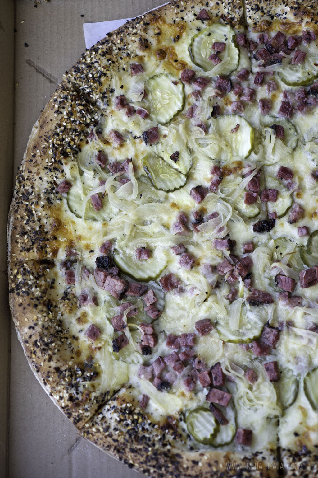 pastrami and pickles on pizza from a pizza joint in Seattle