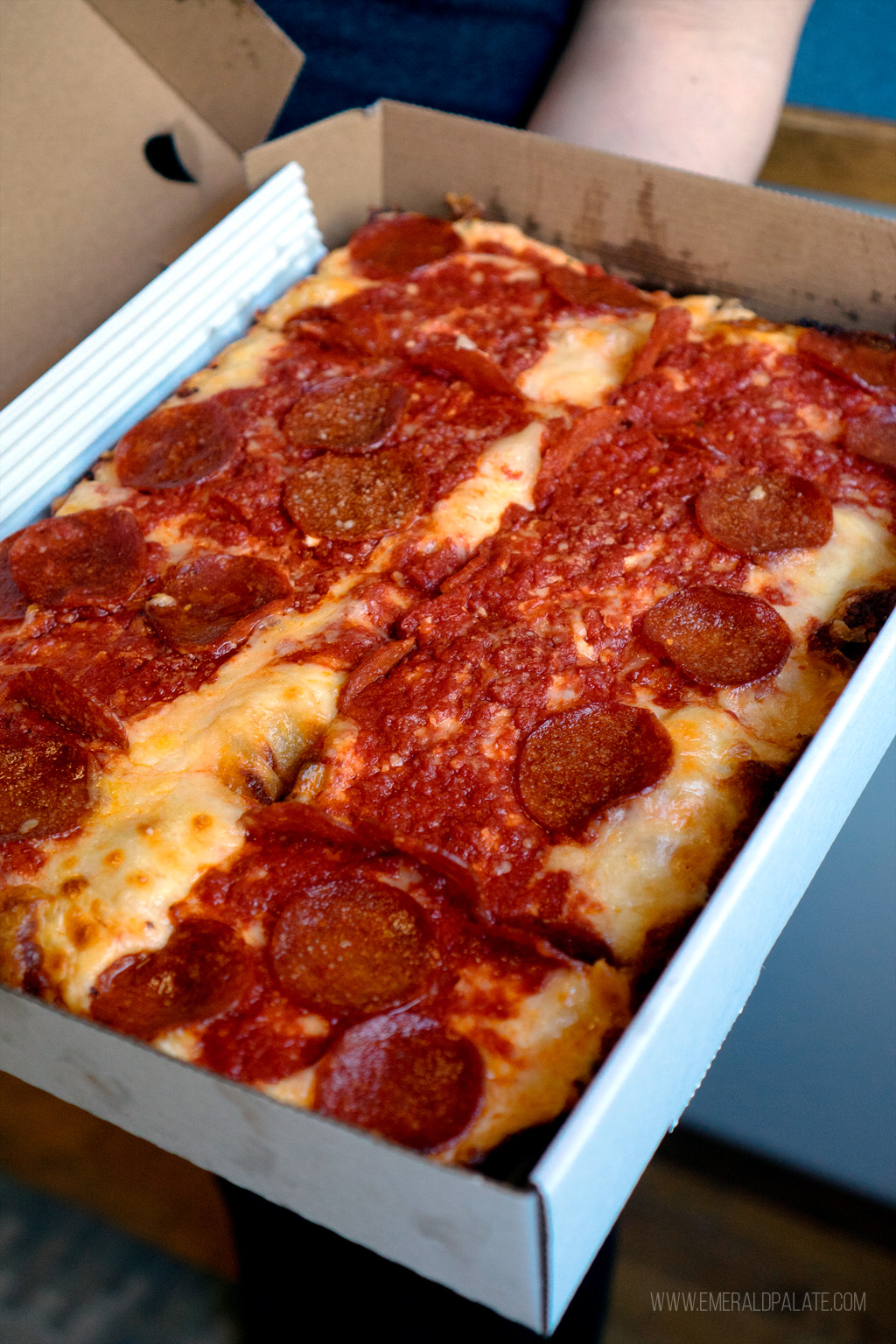 cheesy pepperoni Detroit style pizza in Seattle
