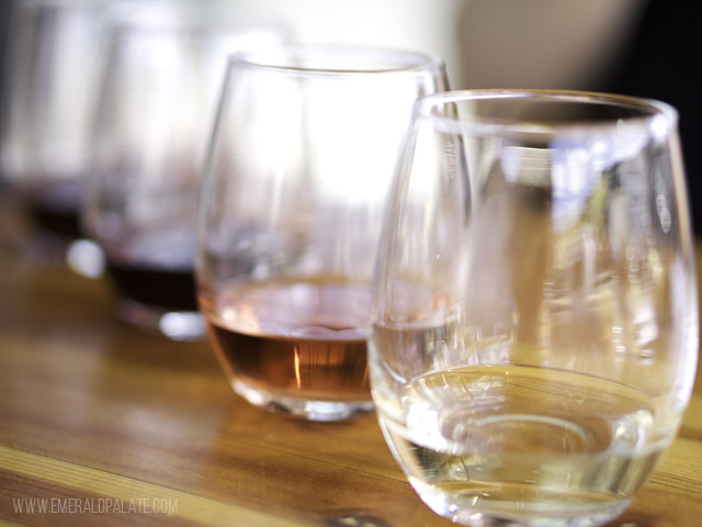row of wine tasting glasses at a Seattle wine shops