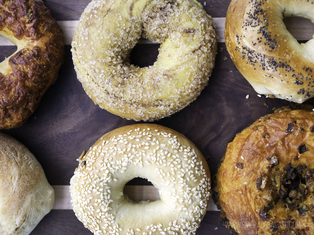 6 of Seattle's best bagels on a cutting board