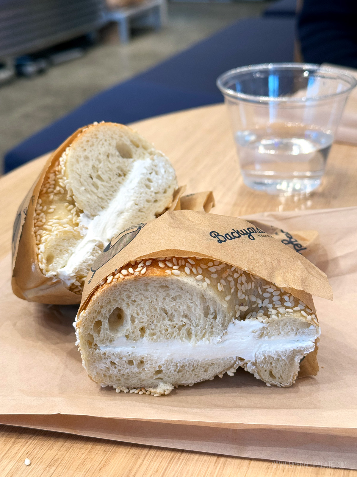 bagel cut in half with cream cheese