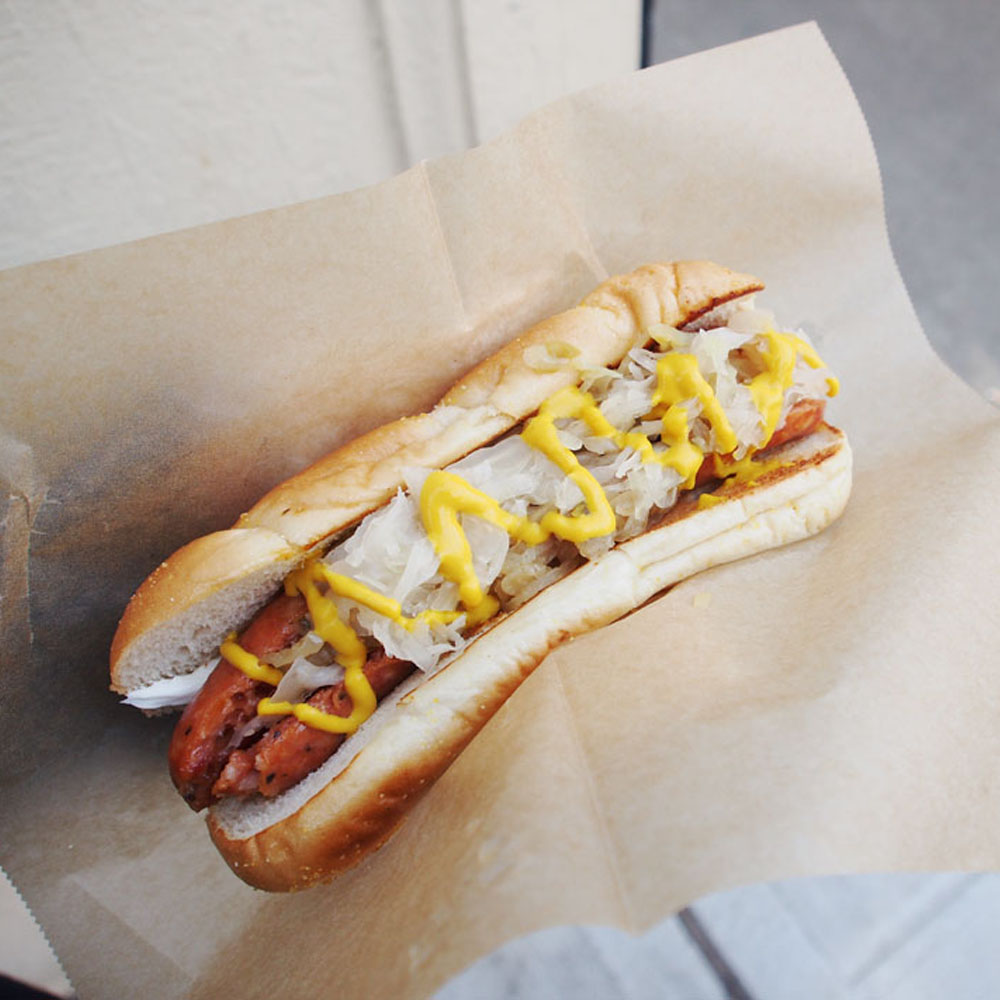 Hot dog with fixings on a Seattle walking food tour