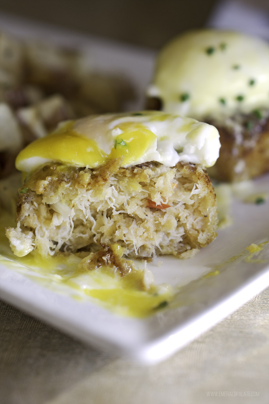 Crab cake Benedict with a runny egg from one of the best places to buy seafood in Seattle