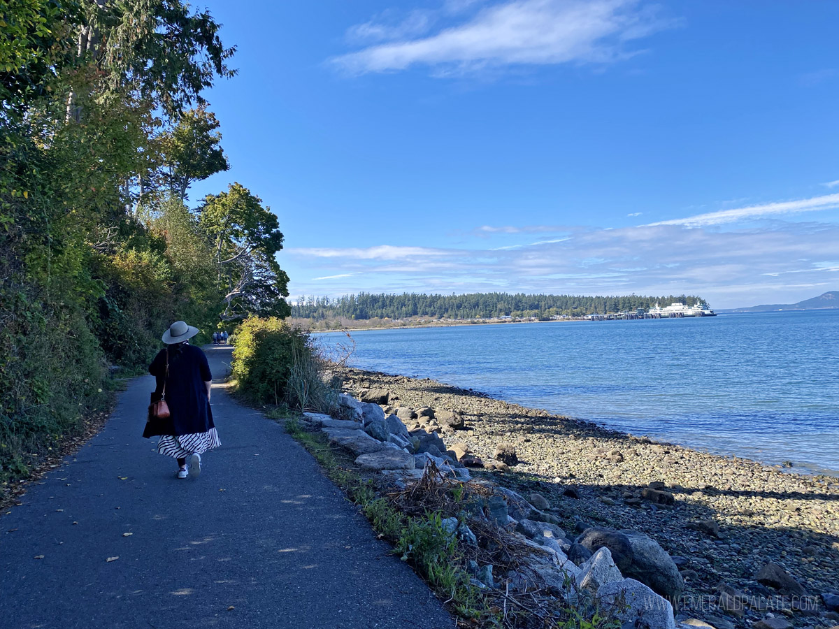 woman watching the ferry on a trail that's one of the best things to do in Skagit County
