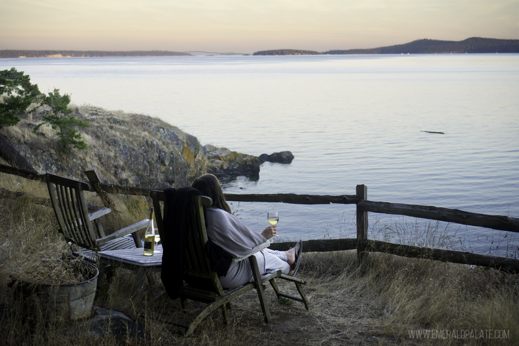 woman overlooking water on San Juan Island at sunset