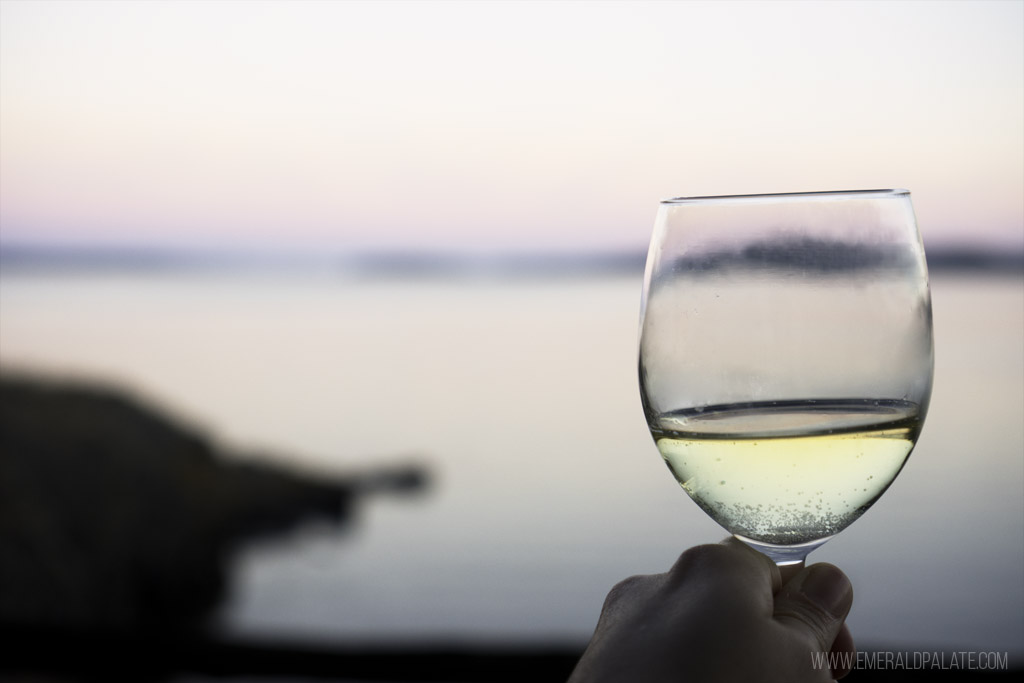 close up of sunset view through wine glass