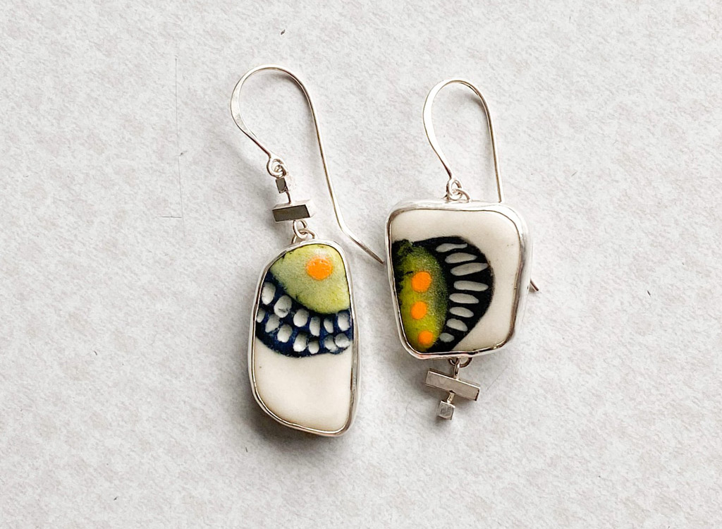 natural stone earrings with a butterfly-like abstract pattern