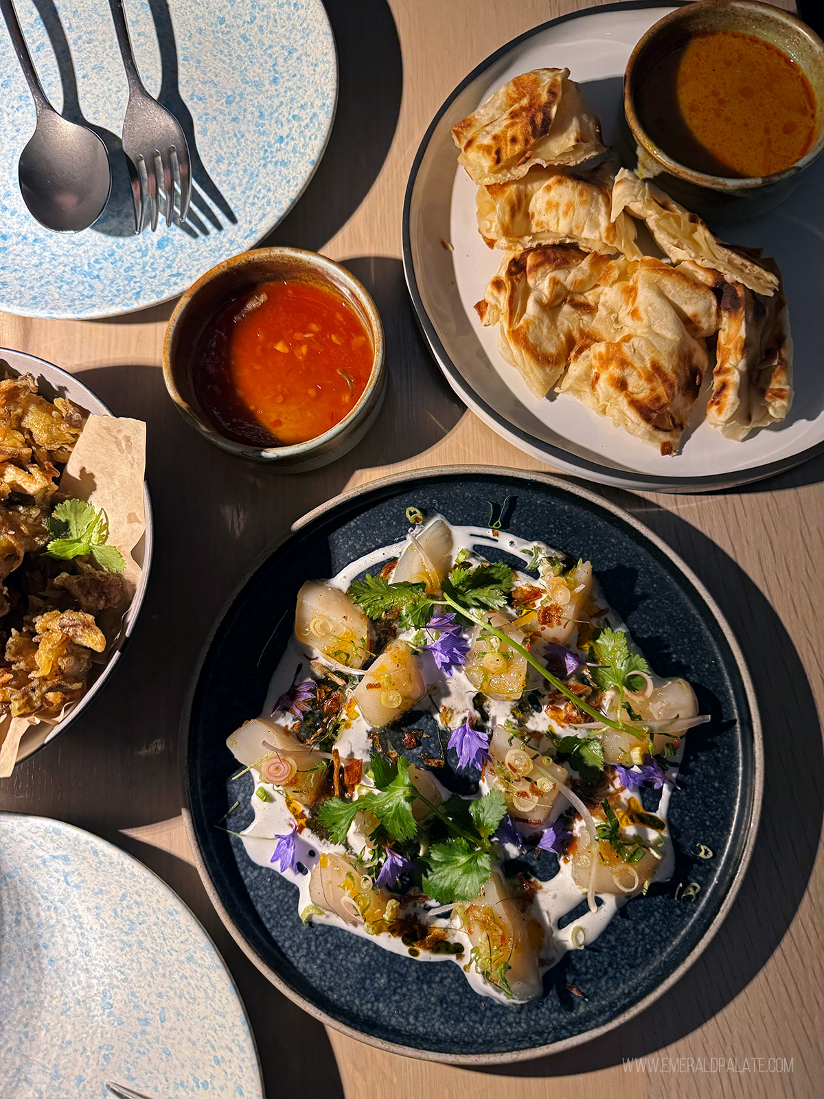 Thai food of scallop crudo and roti from a Whistler restaurant