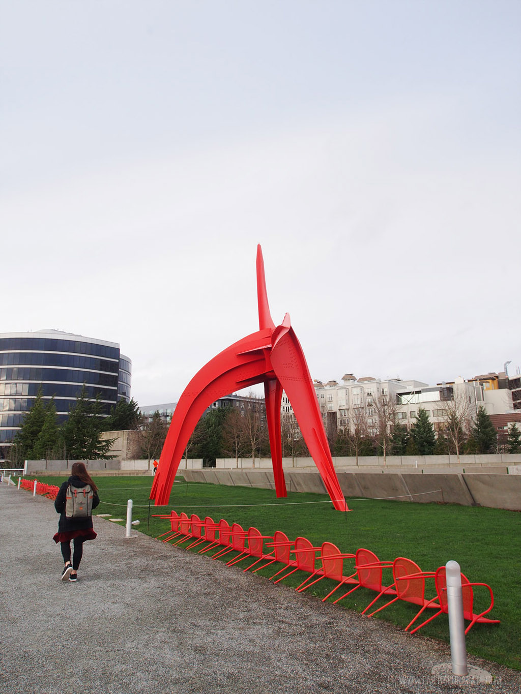 person walking at the Olympic Sculpture Park, a must visit during your one day itinerary in Seattle
