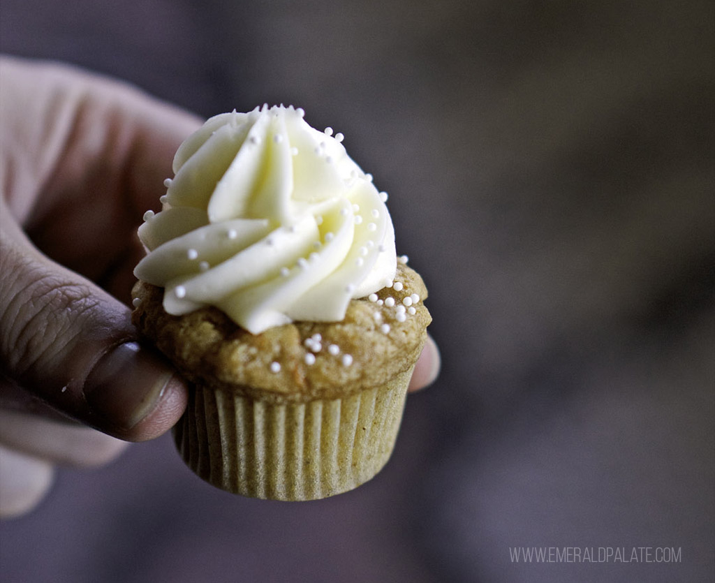 person holding mini cupcake from Seattle dessert delivery