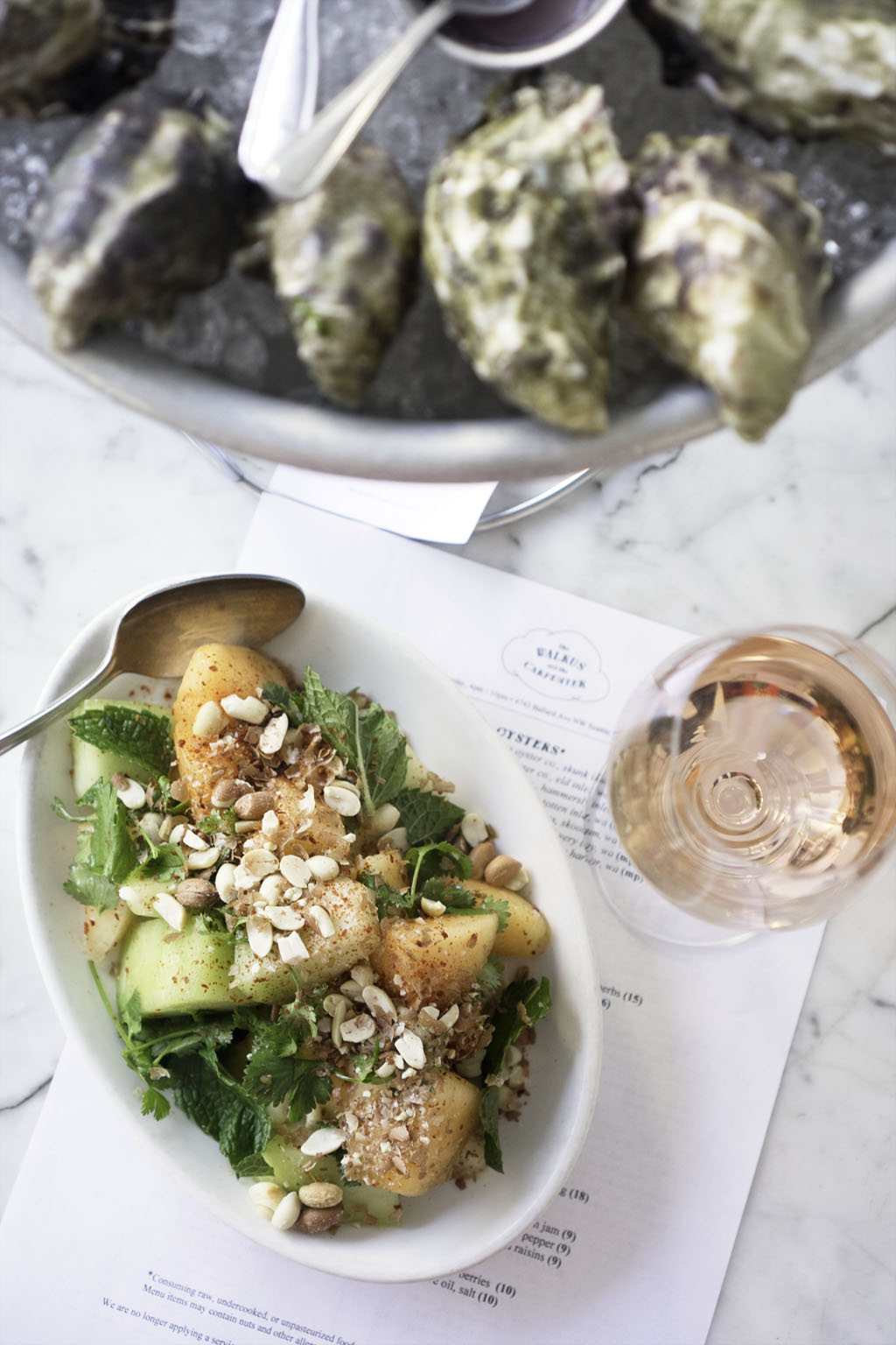 oysters, salad, and wine from one of the best Seattle oyster bars