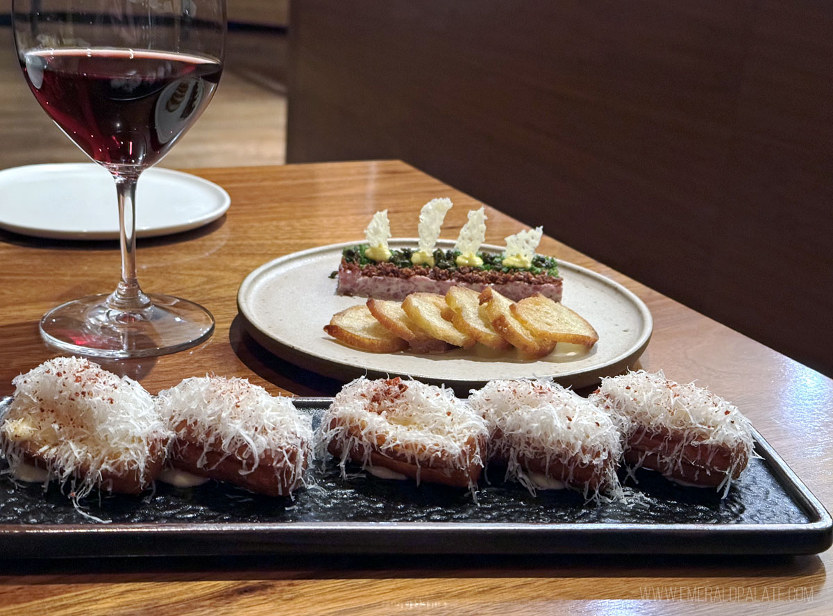 Parmesan churros and steak tartare at a fancy restaurant in Seattle