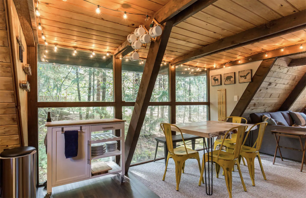 inside a winter cabin in Washington with a lot of windows