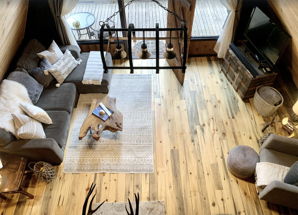 overhead loft view of the living room in an a-frame cabin in Washington state
