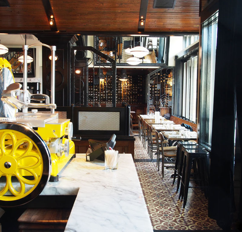 charcuterie slicer on a counter at one of the best Italian restaurants in Seattle