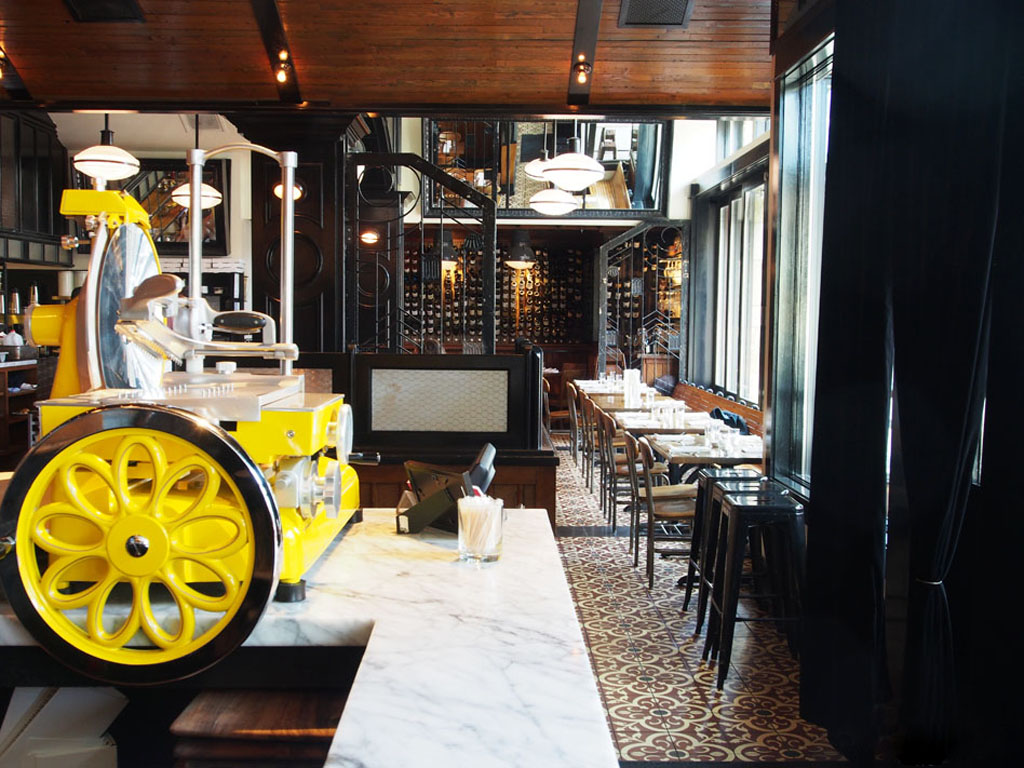 charcuterie slicer on a counter at one of the best Italian restaurants in Seattle