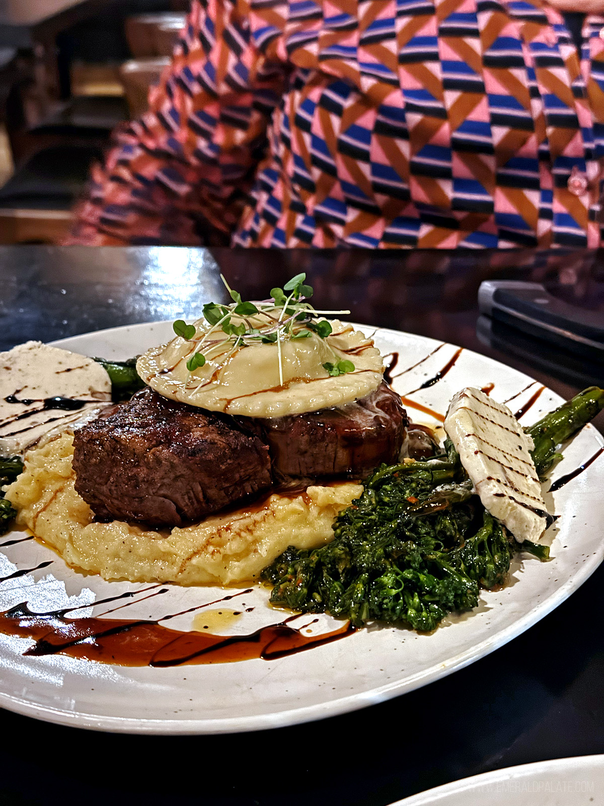 steak with a ravioli on top over risotto, one of the best restaurants in Leavenworth